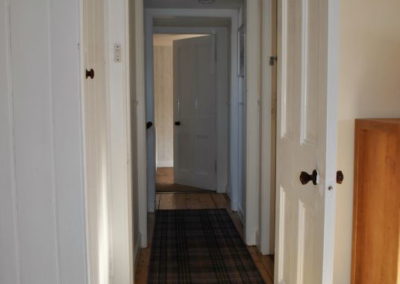 Hallway with wooden floors