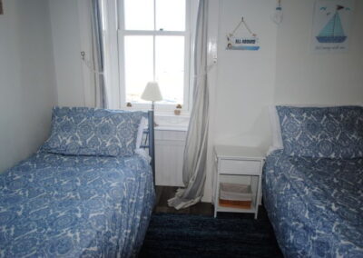 Single beds either side of window