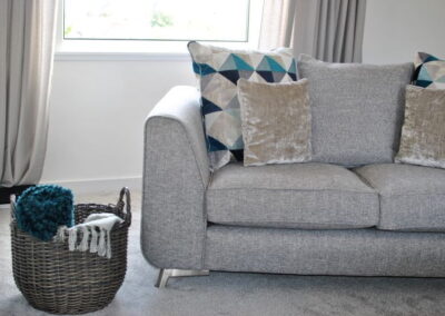 Grey sofa with cushions
