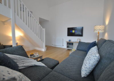 Corner sofa, wall-mounted TV
