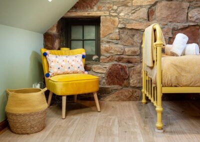 Making the most of original features such as exposed stone walls
