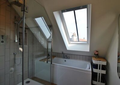 The master en -suite has a bath and separate shower