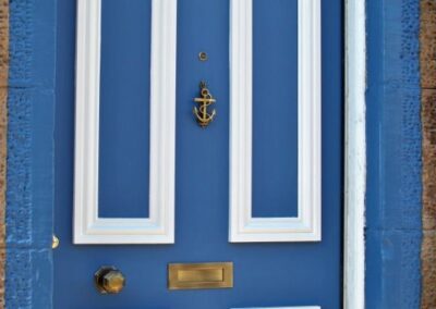 Front door with anchor door knocker.