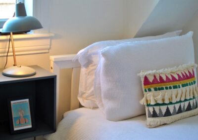 Close-up of pillows on bed