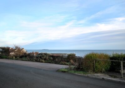 View across road towards the sea and the Isle of May beyond.