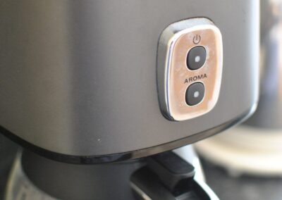 Close-up of DeLonghi coffee machine