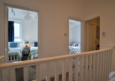 View over banister towards bedrooms.